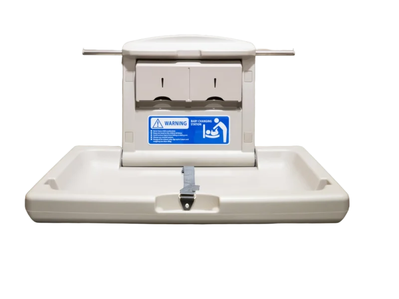 Wall-mounted baby changing table in a Warwick commercial washroom – hygienic, secure, and space-efficient design